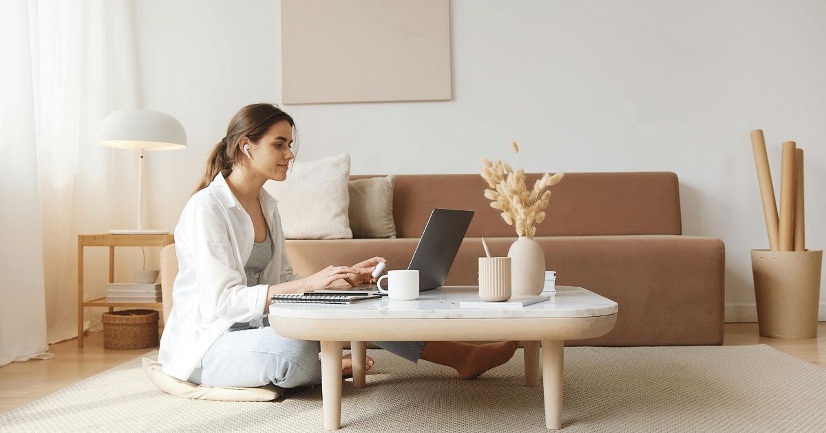 image-13 - California Mental Health Woman using laptop for teletherapy session. Modern mental health treatment at home with online therapy and comfortable setting.