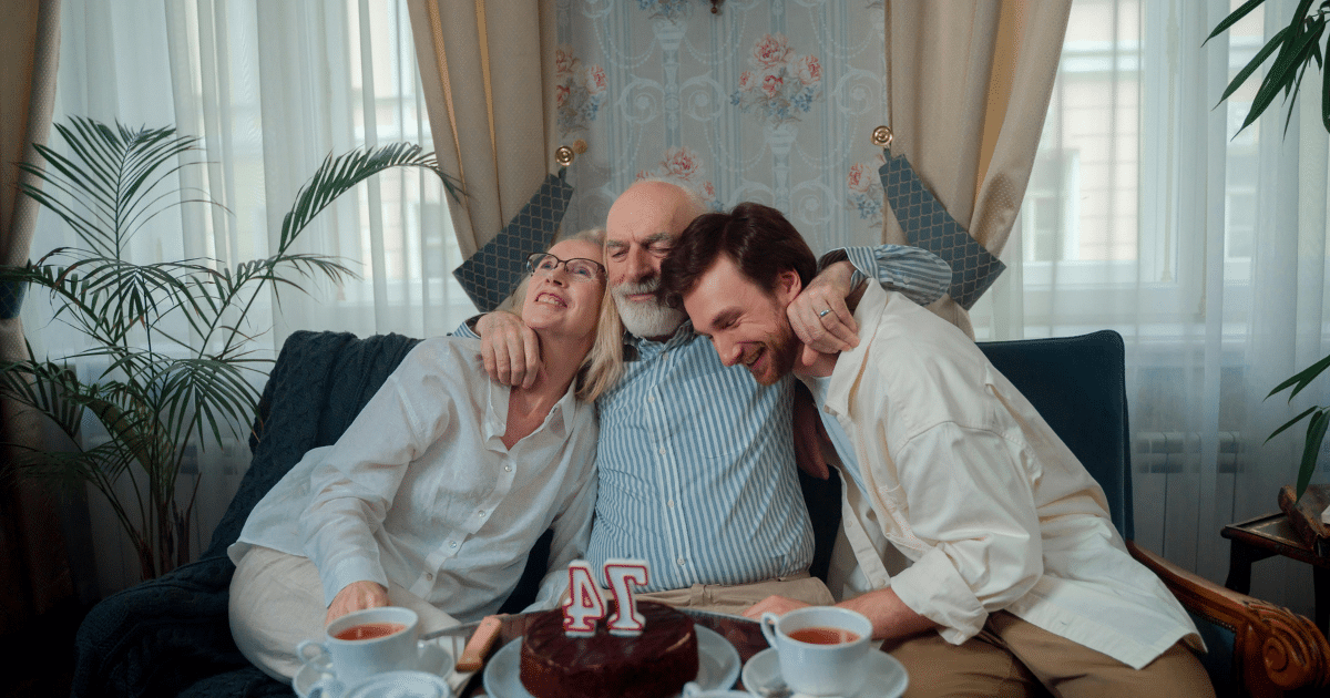 image-24 - California Mental Health Celebrating Mindfulness: Family embracing with birthday cake, fostering mental health and happy moments together. 41st birthday.