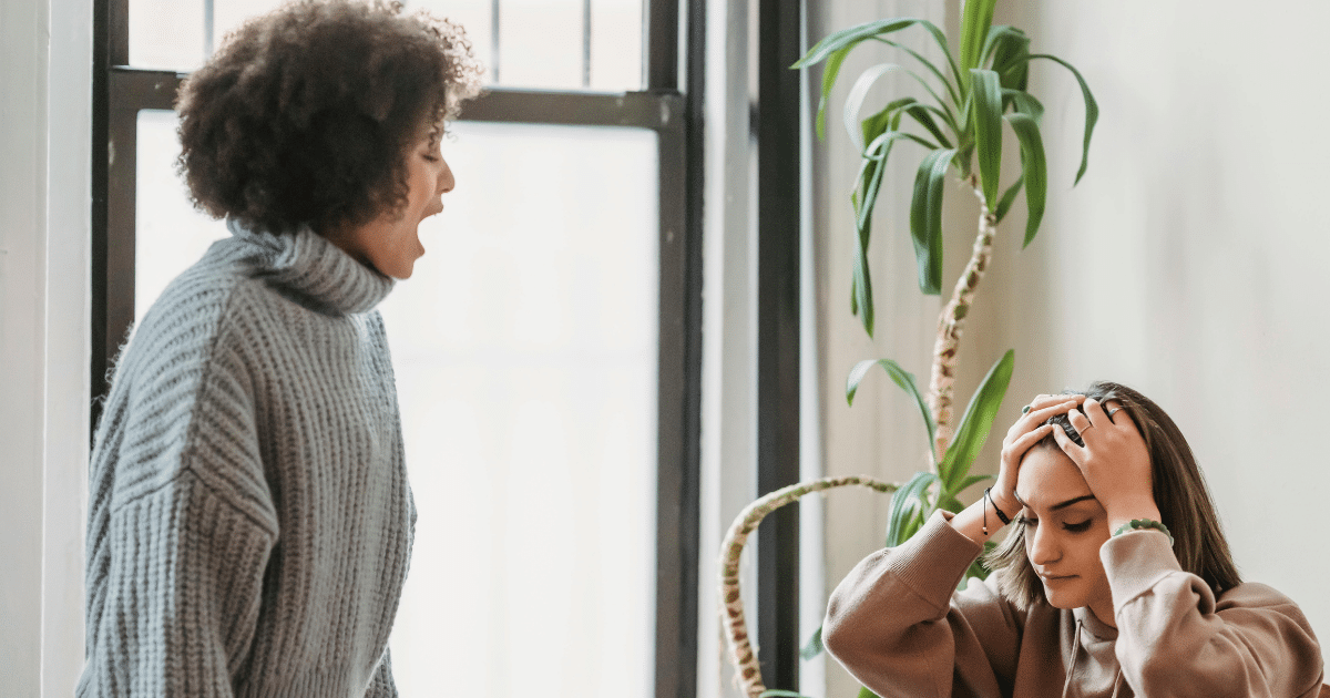 AD_4nXcZY-3oe0bIel8iYL8uS-j8yJwdPv8HagSECySOeZANXCbgWKHu4xN2v0Vp0OInQwwB7_4XVNj62Tj0eU-ZYQOFQiYjH-nqQ9gEZUbaByg7rGLYzG--TKzlU8Axsr2q5uR9onFo - California Mental Health COVID era mental wellness: Woman yelling at another with head in hands, portraying stress and conflict during challenging times.