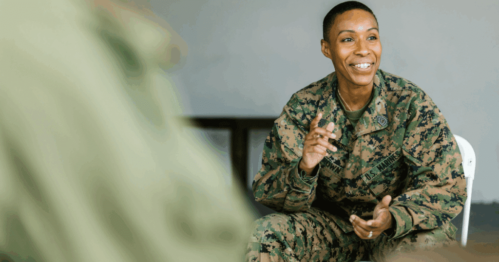 image - California Mental Health Smiling U.S. Marine in uniform discussing PTSD therapy options. Professional help can transform your life.